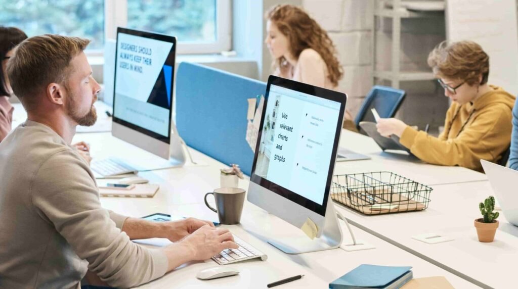 People working in front of the computer